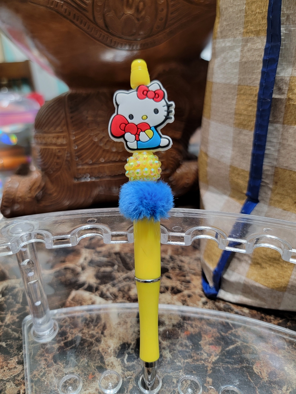 Hello Kitty Yellow Pen with Blue Pom Pom and Red Accents